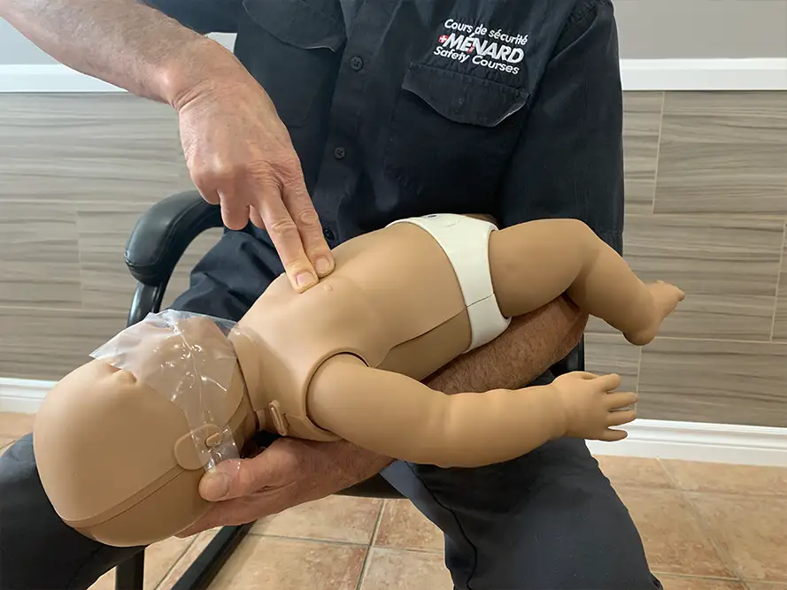 Showing how to do CPR on dummy